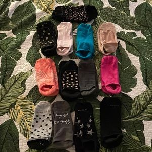 Bundle of 13 Pure Barre socks. Some are a small and some are mediums.